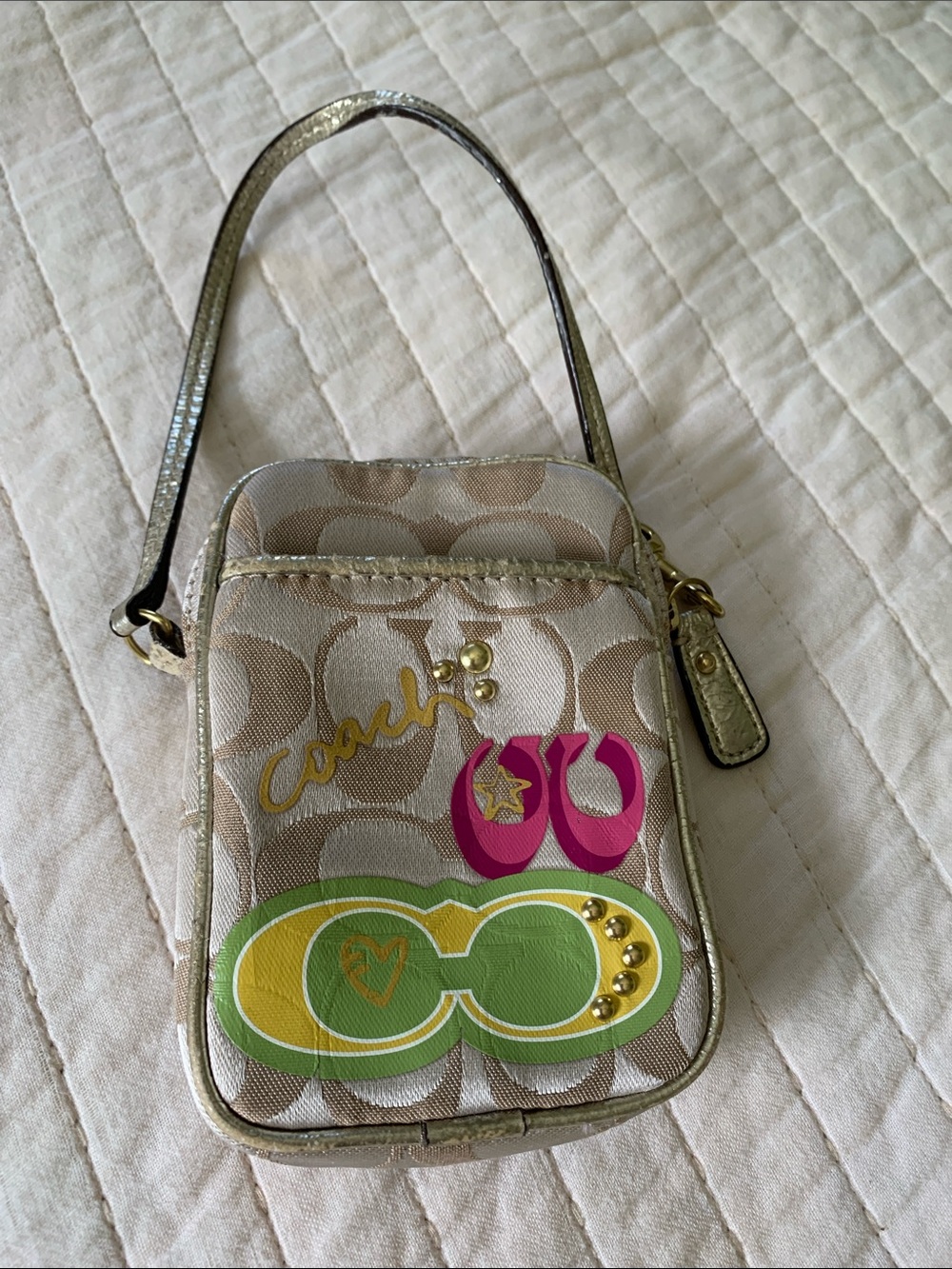 Coach Metallic Gold Signature Phone Wristlet with Pink and Green Accents